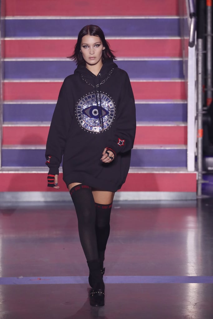 Bella sported an oversize graphic hoodie with socks.