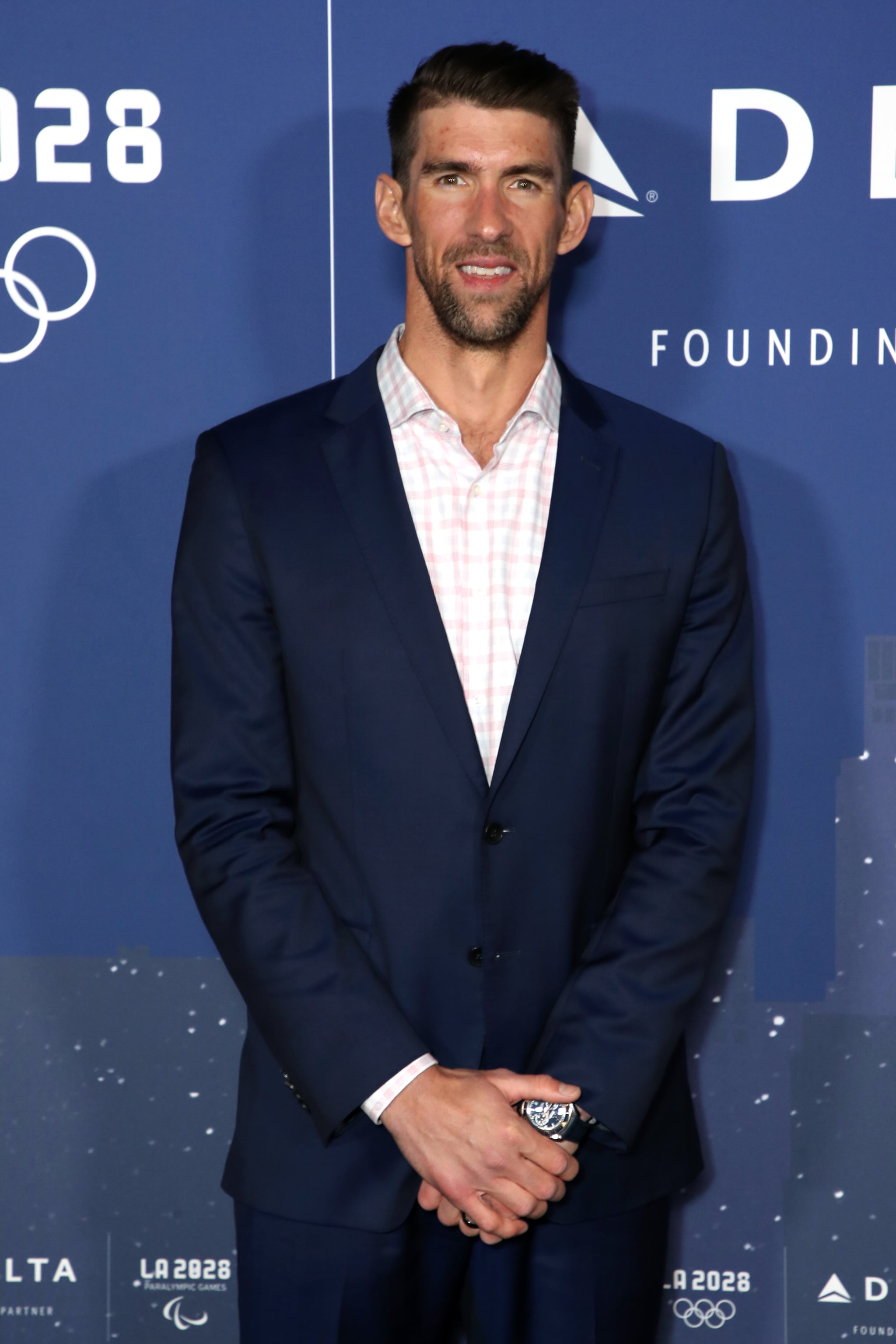 LOS ANGELES, CALIFORNIA - MARCH 02: US Olympian Michael Phelps poses at the event to announce the Founding Partnership between Delta Air Lines and LA28 at Griffith Observatory on March 02, 2020 in Los Angeles, California. (Photo by Joe Scarnici/Getty Images for LA28)