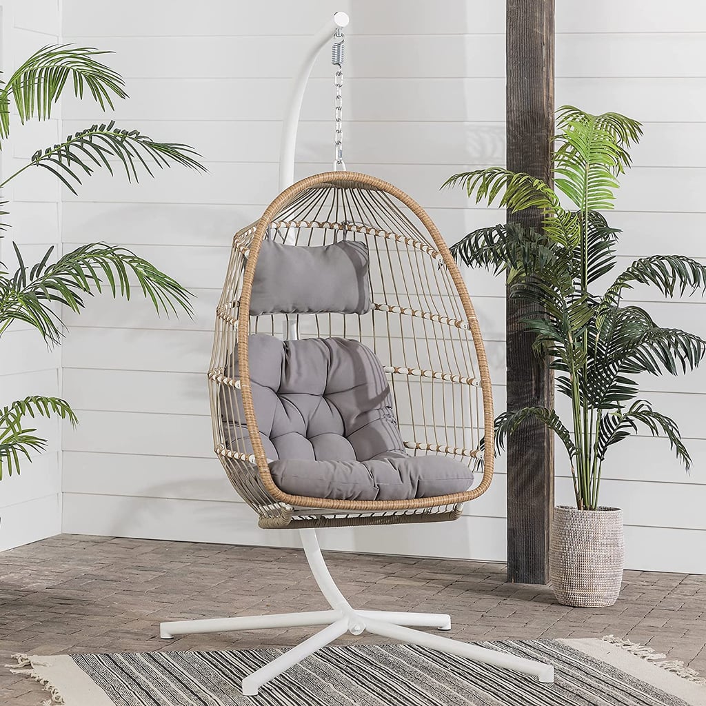 A Hanging Egg Chair: Rattan Hanging Egg Swing Chair