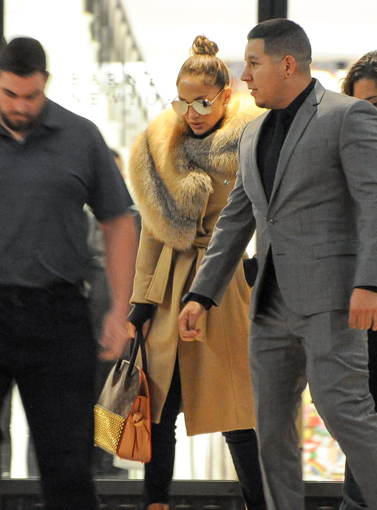 Jennifer Lopez Wearing a Wrap Coat With a Fur Collar 2016