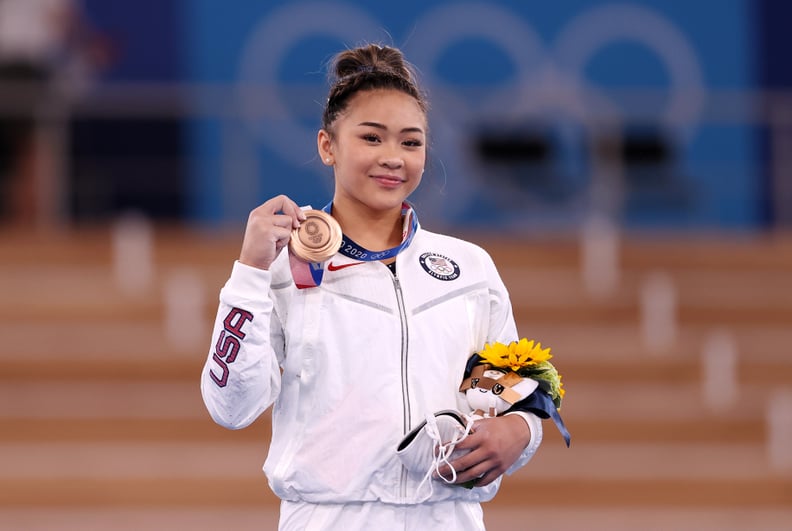 TOKYO, JAPAN - AUGUST 01: Bronze Medalist Sunisa Lee of Team United States poses with her medal on the podium during the Women's Uneven Bars Final medal ceremony on day nine of the Tokyo 2020 Olympic Games at Ariake Gymnastics Centre on August 01, 2021 in