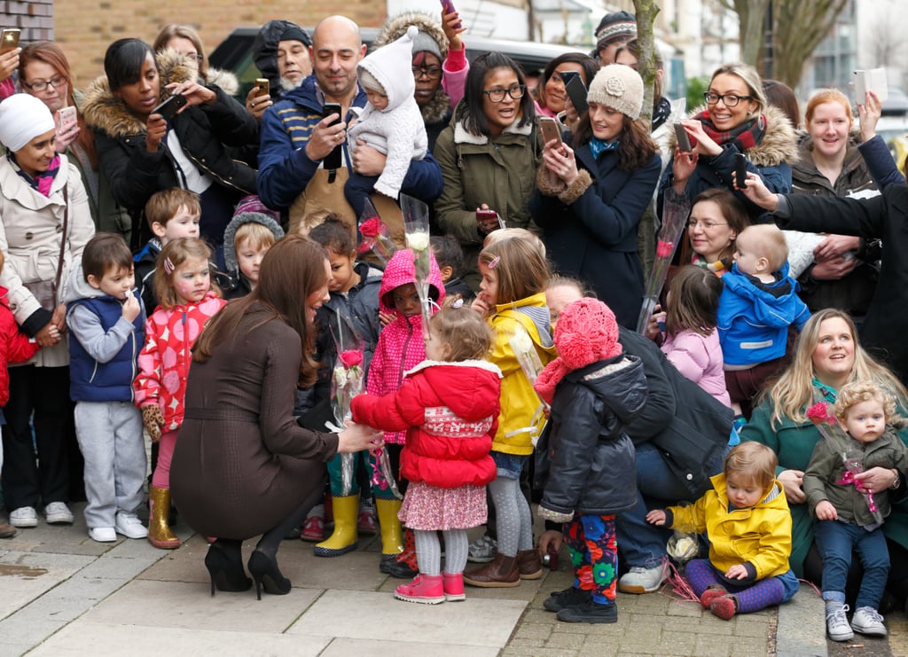 Throngs of fans are no match for Kate's crouching stance.