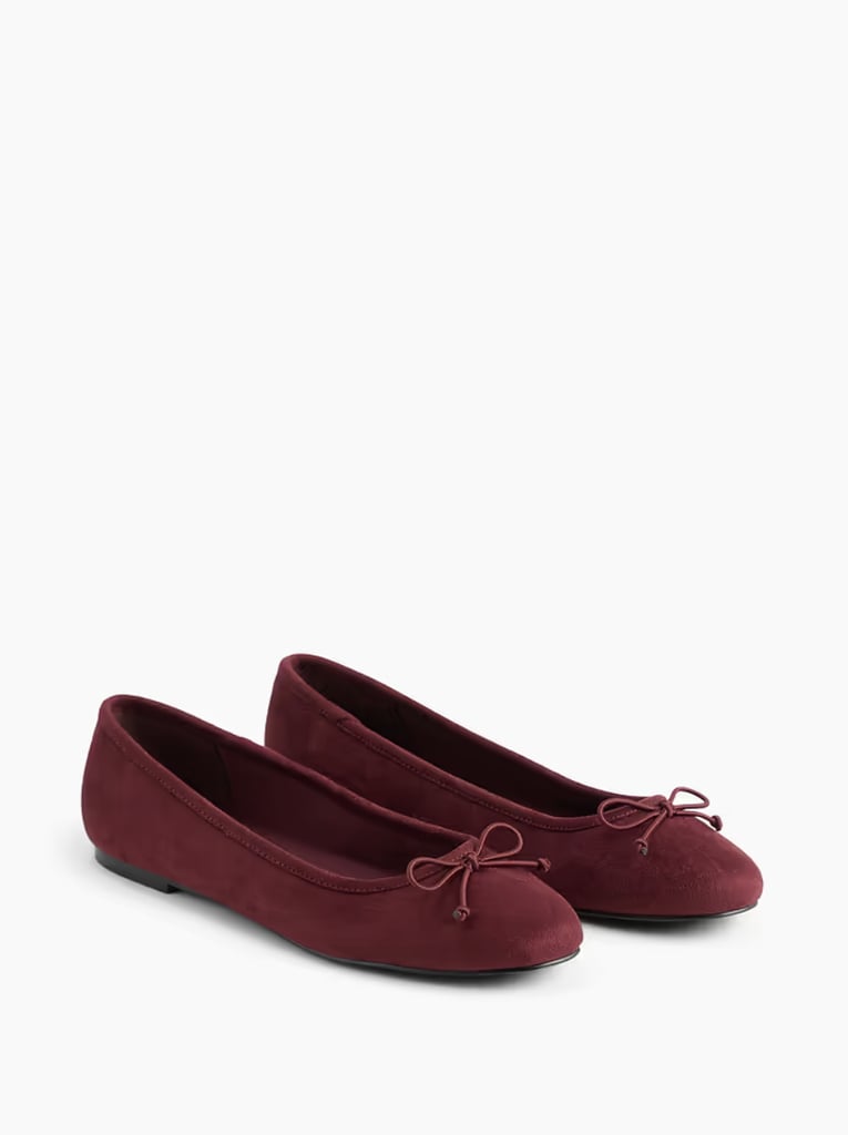 Gap Vegan Suede Ballet Flats ($47, originally $60)
It is no secret that ballet flats are the shoe of the moment. They are easy to slip on and make any outfit fit a minimalist aesthetic. Consider this maroon suede design the perfect fall iteration of the trendy style.