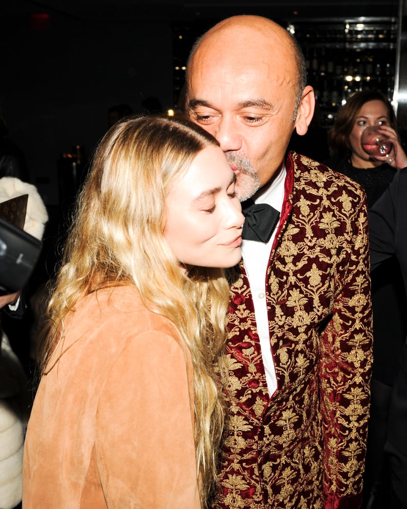 But Christian Louboutin and Ashley Olsen's Smooch Is Just as Cute
