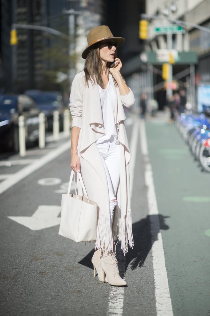 Alessandra Ambrosio stood out from the crowd in an all-white ensemble.