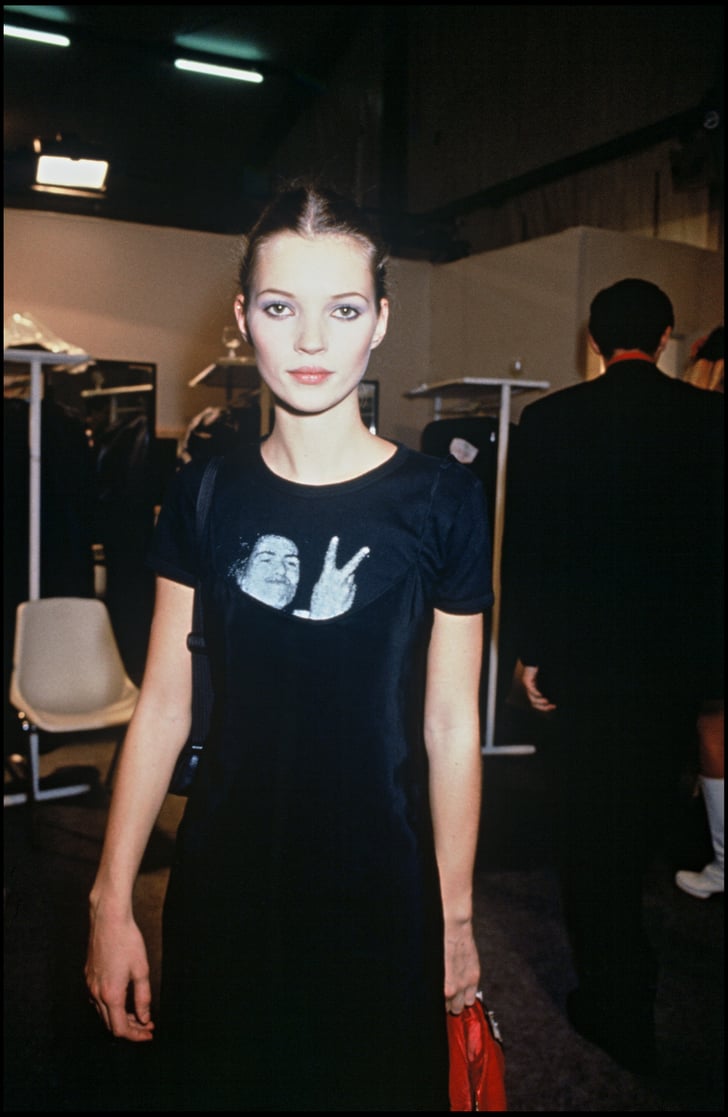 Backstage at Paris Fashion Week in 1994, wearing a statement tee