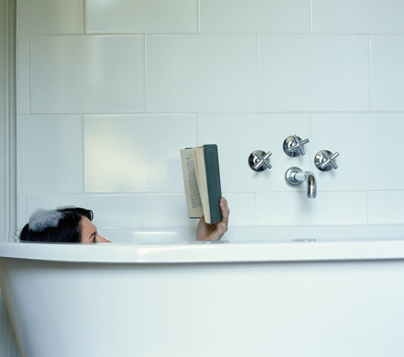 Relax with a book in the bathtub.