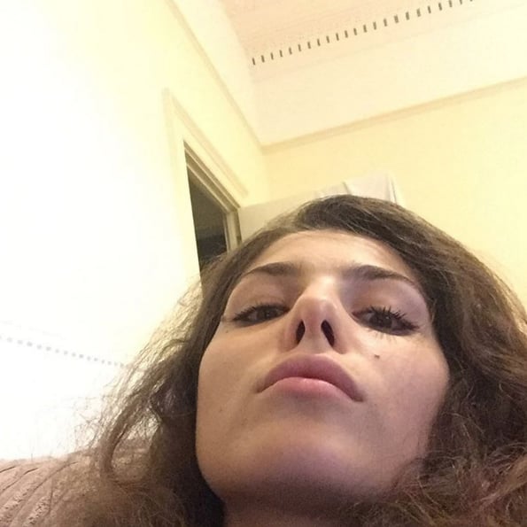 "When you go to take a selfie but your camera takes a shot before you're ready. Double chins and all!"