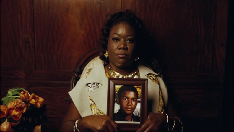 Sybrina Fulton holding a picture of Trayvon Martin