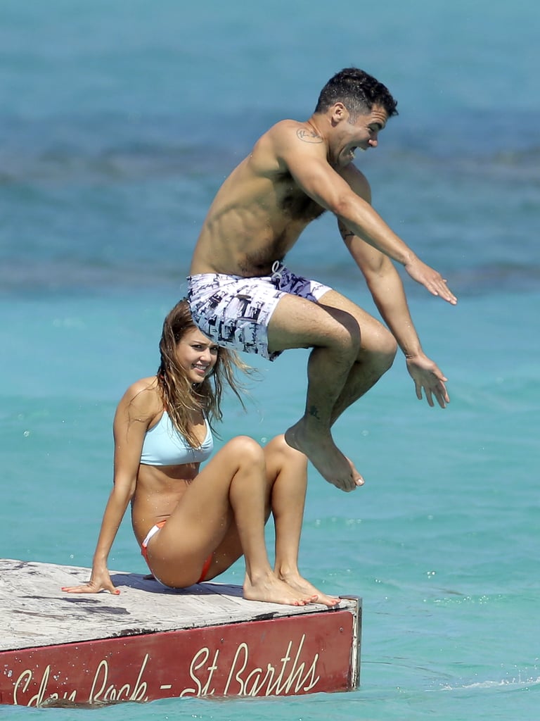 Jessica watched as Cash cannonballed into the St. Barts water while on vacation in April 2013.