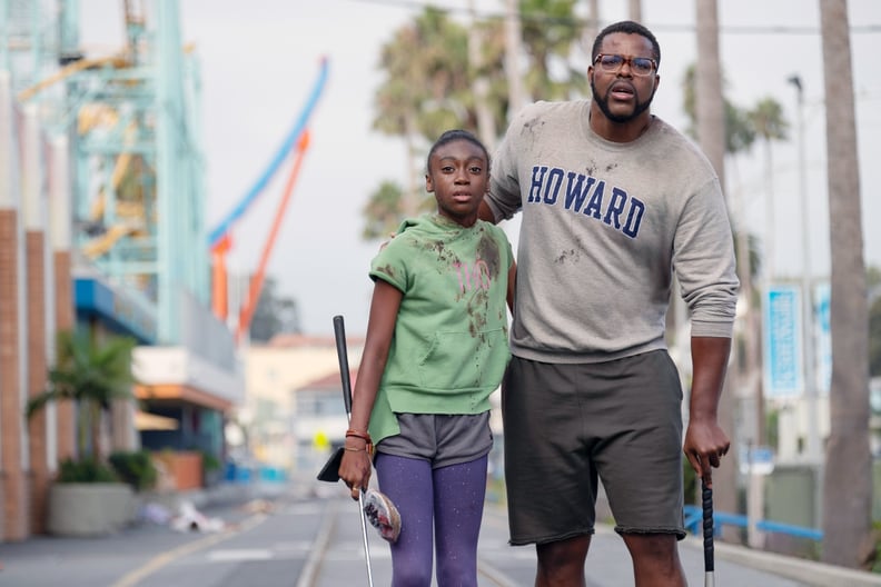 US, from left: Shahadi Wright Joseph as Zora Wilson, Winston Duke as Gabe Wilson, 2019. ph: Claudette Barius /  Universal / courtesy Everett Collection