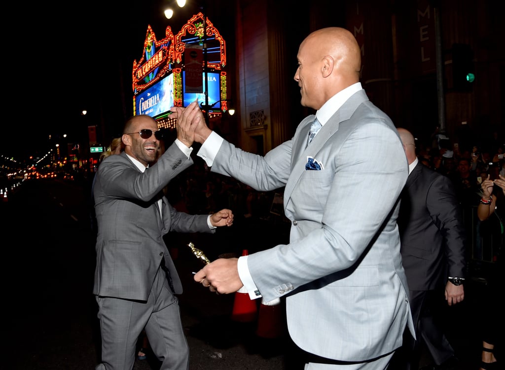 Dwayne Johnson and Jason Statham high-fived each other at the Hollywood premiere of Furious 7 in April 2015.