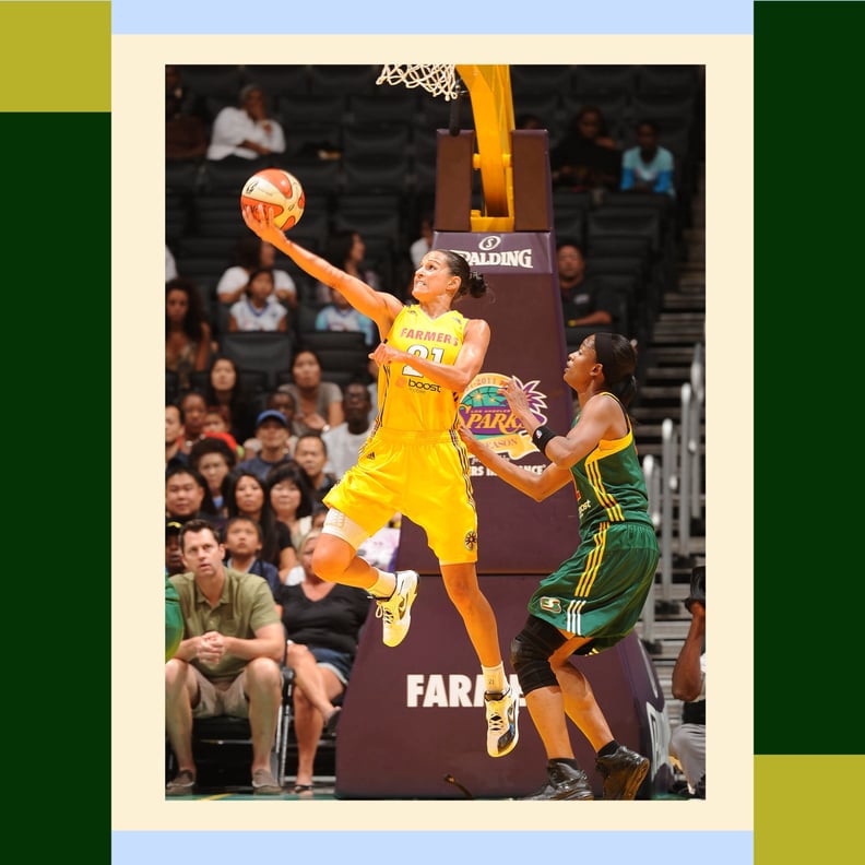 Ticha Penicheiro of the LA Lakers shooting a layup during a game.