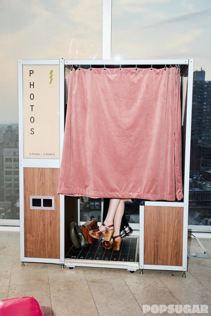 Guests take photos in the Majestic Photobooth.