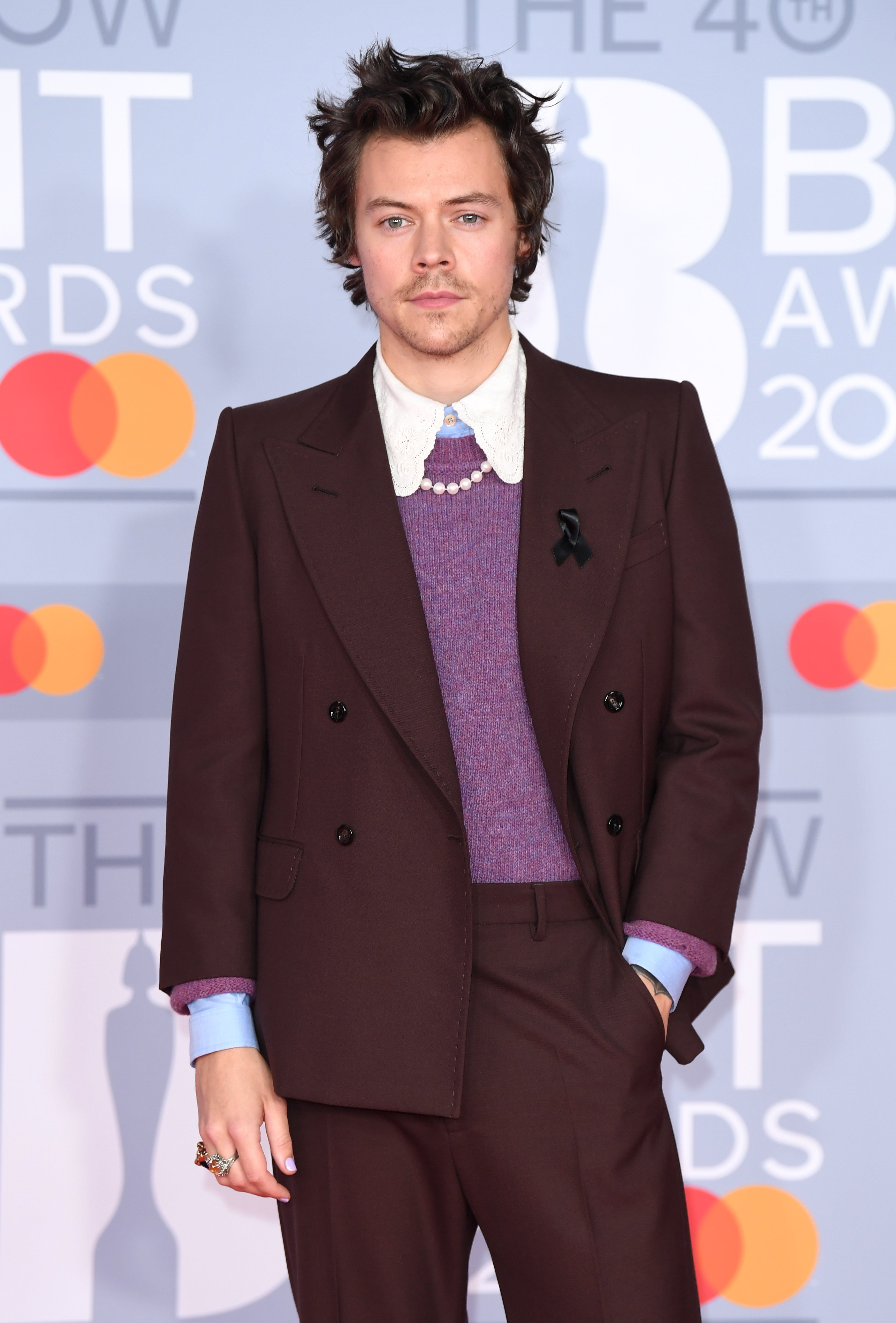 See Harry Styles s Best Jewelry Moments POPSUGAR Fashion