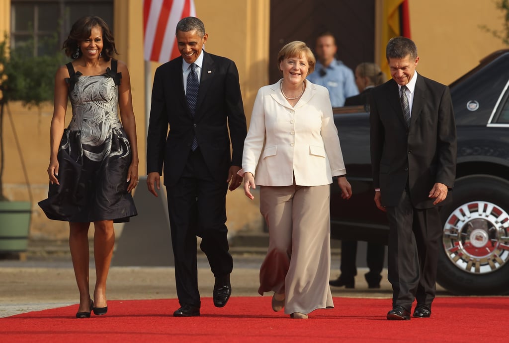 Barack and Michelle Obama attended a dinner in the president's honor with German Chancellor Angela Merkel and her husband, Joachim Sauer, in Berlin, Germany, in June 2013.