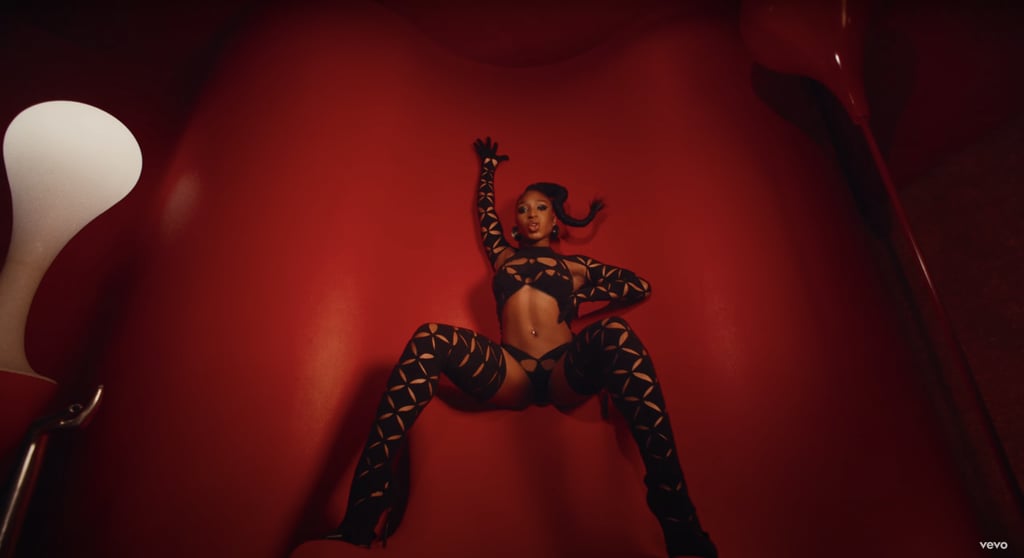 She starts off the video with this custom cutout moment by Isa Boulder.