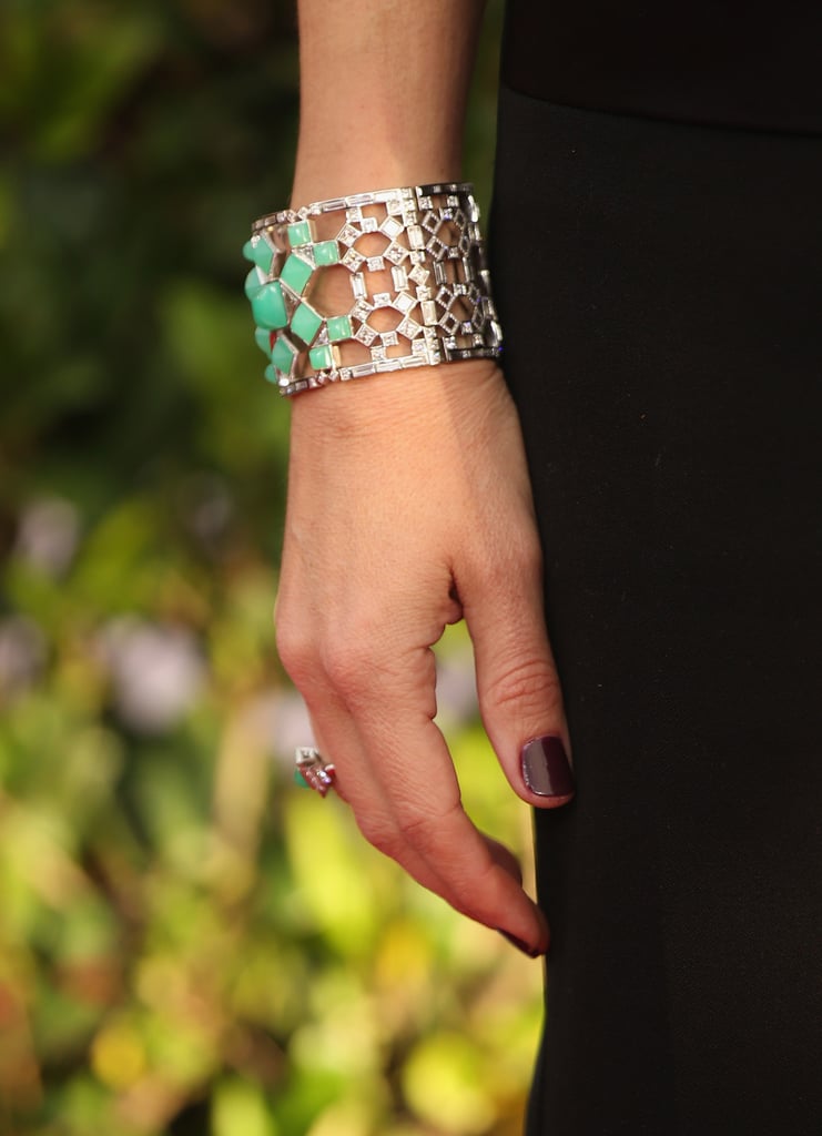 We weren't just focused on how great Julia Roberts looked in that Givenchy jumpsuit. We also couldn't get cover her subtle sprinkle of color. The star accessorized with a Tiffany & Co. ring and intricate cuff.