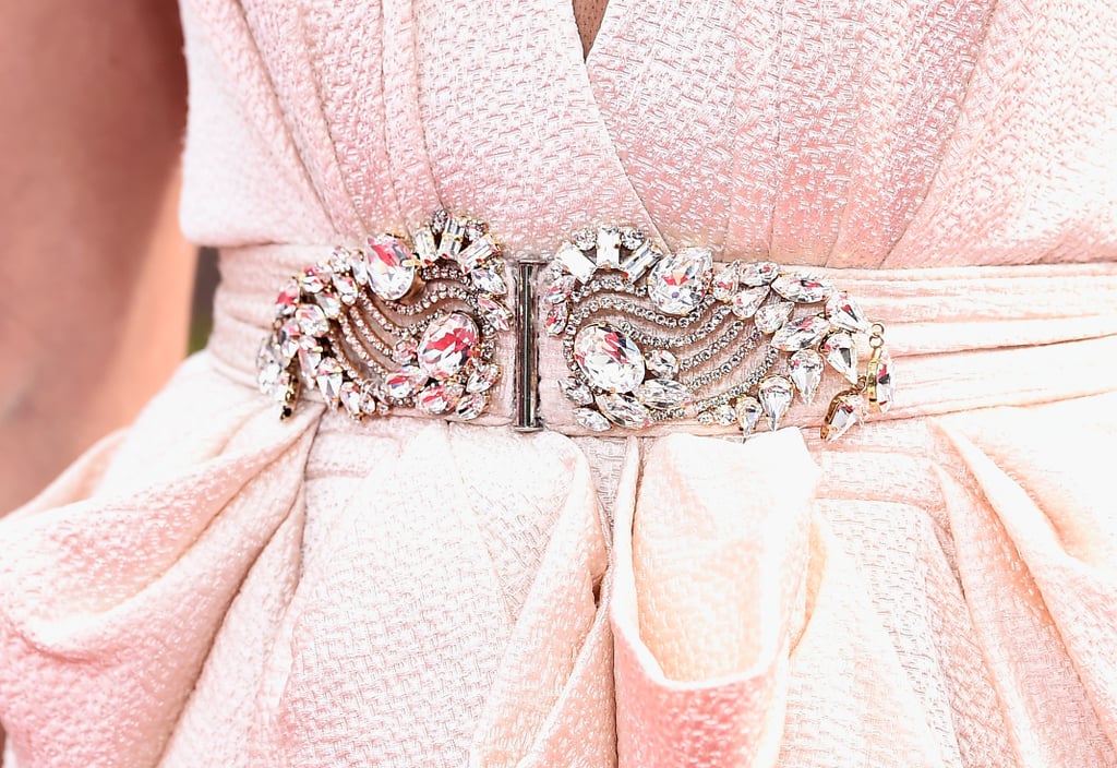 Louise Roe added glitz to her Jenny Packham gown with this jeweled clasp.
