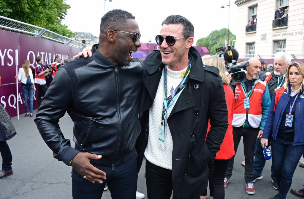 Idris Elba and Luke Evans cuddled up at the Paris E-Prix.