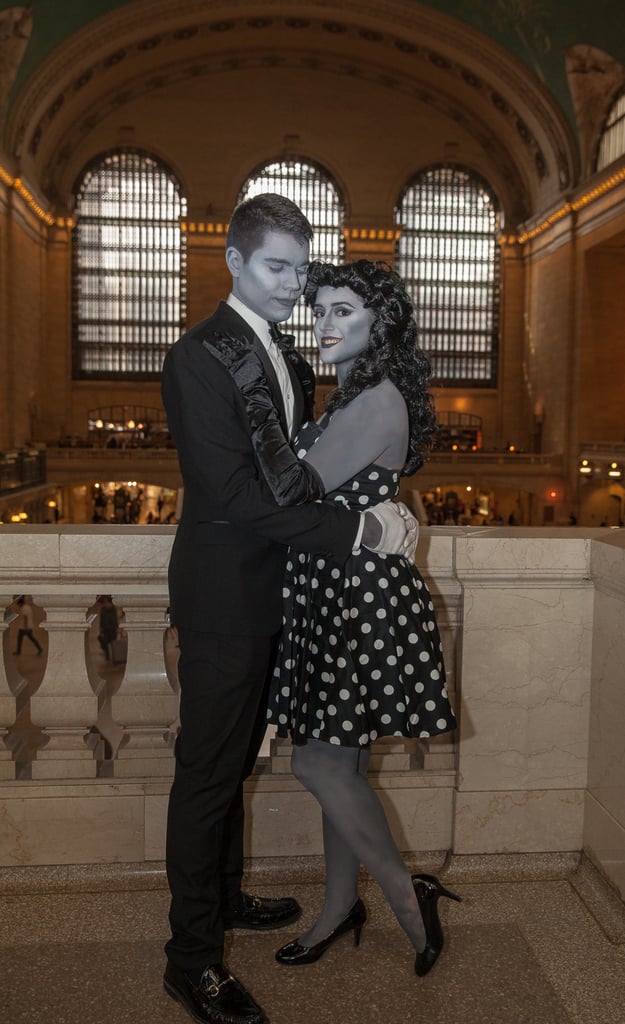 You Will Feel Like a Freak — and Love It
As we paused to take photos in Grand Central, we caused a legitimate scene. There was such a large crowd surrounding us taking pictures that Nick whispered to me, "we should have a tip jar." Any initial reservations I had about rocking Halloween in real life vanished, and I started playing into my character. I broke out a few robot dance moves, posed like a retro movie star, and winked at passersby. 
Sure, there was the occasional "What the f*ck?!" from pedestrians, but the positive reactions outweighed the negative ones. My heart melted when a little boy approached me, completely entranced, and his mom asked if he could take his photo with us. I was practically ready to quit my day job and become a performer in Times Square or be a professional princess for birthday parties.
I didn’t even bother trying to take off the makeup before heading home, which means I rocked face makeup on public transportation. While we’d experienced friendly New Yorkers as a duo, going grayscale solo yielded more awkwardness. No one would look me in the eye except my bus driver, who said, "should I even ask?" as I climbed aboard. "Just another day at the office!" I chirped.