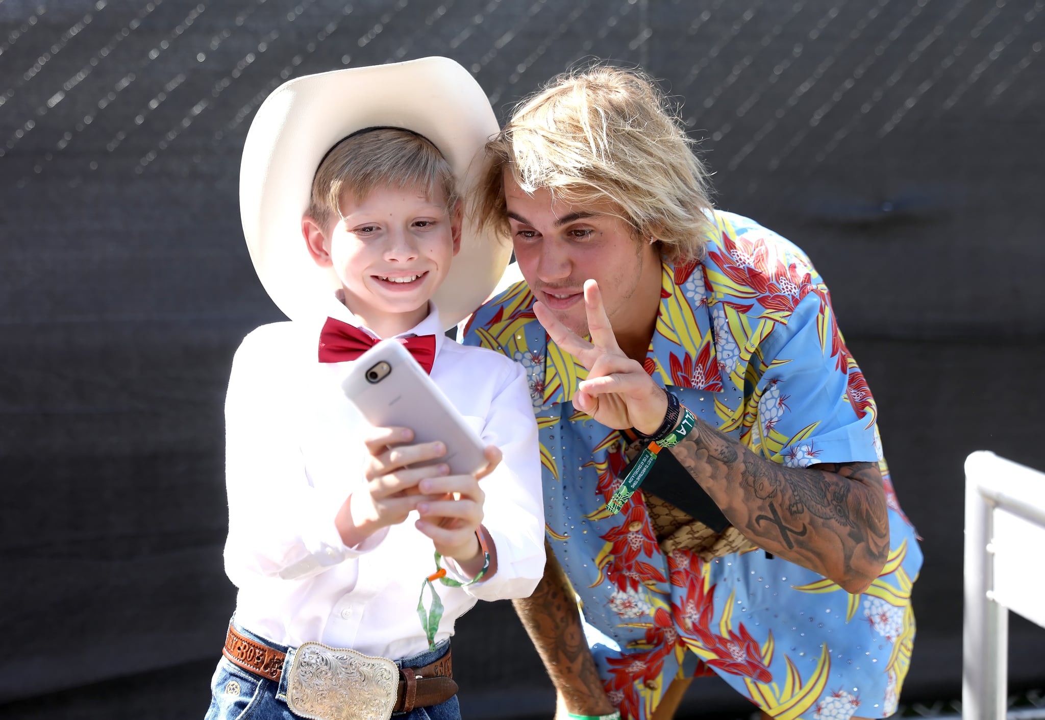 INDIO, CA - APRIL 13:  Viral internet sensation Mason Ramsey aka The Walmart Yodeling Boy, (L) and Recording Artist Justin Bieber pose for a selfie backstage during the 2018 Coachella Valley Music And Arts Festival at the Empire Polo Field on April 13, 2018 in Indio, California.  (Photo by Natt Lim/Getty Images for Coachella)