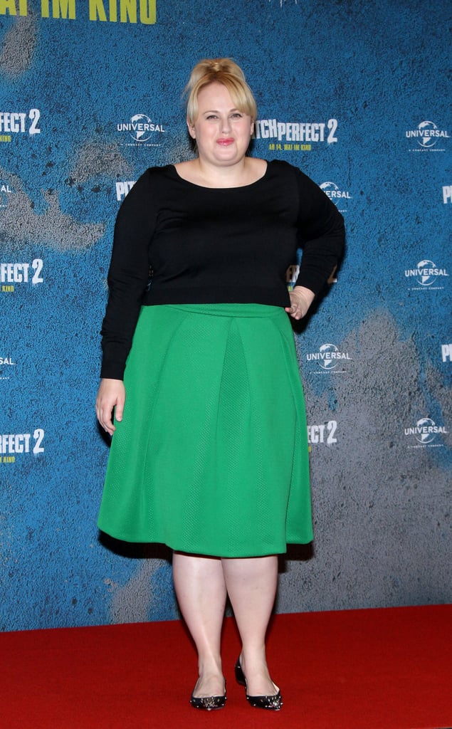 Even though she matched with costar Elizabeth Banks, Rebel stood out on the red carpet at the Pitch Perfect 2 photocall, wearing this bright green midi skirt.