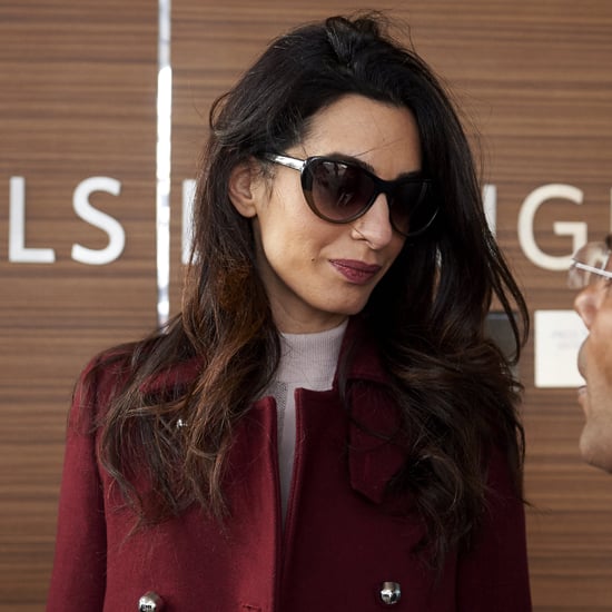 Amal Clooney Wearing a Red Coat
