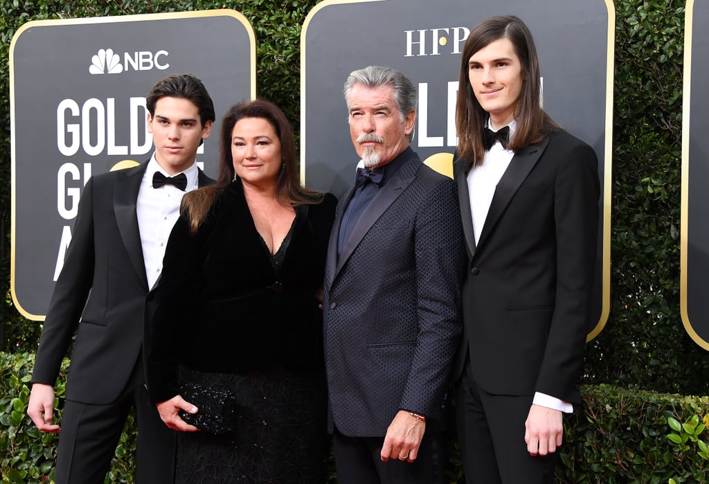 Award season is upon us yet again, and Pierce Brosnan's sons, 18-year-old Paris and 22-year-old Dylan, are kicking things off at the Golden Globe Awards. On Sunday, the models looked dapper as they arrived at the ceremony accompanied by their dad Pierce, mom Keely Shaye Smith, and their girlfriends. 
Paris and Dylan were this year's Golden Globe Ambassadors and assisted in distributing the trophies during the show.