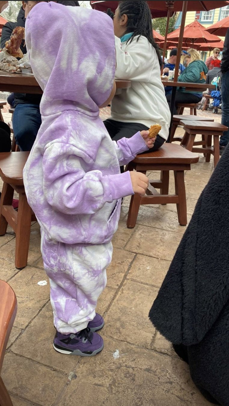 Stormi Webster Enjoying a Snack at Walt Disney World