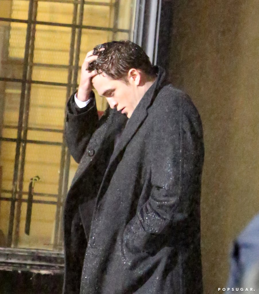 Where's your umbrella, Robert Pattinson!? The actor filmed a rainy scene for his new movie, Life, in Toronto on Thursday.