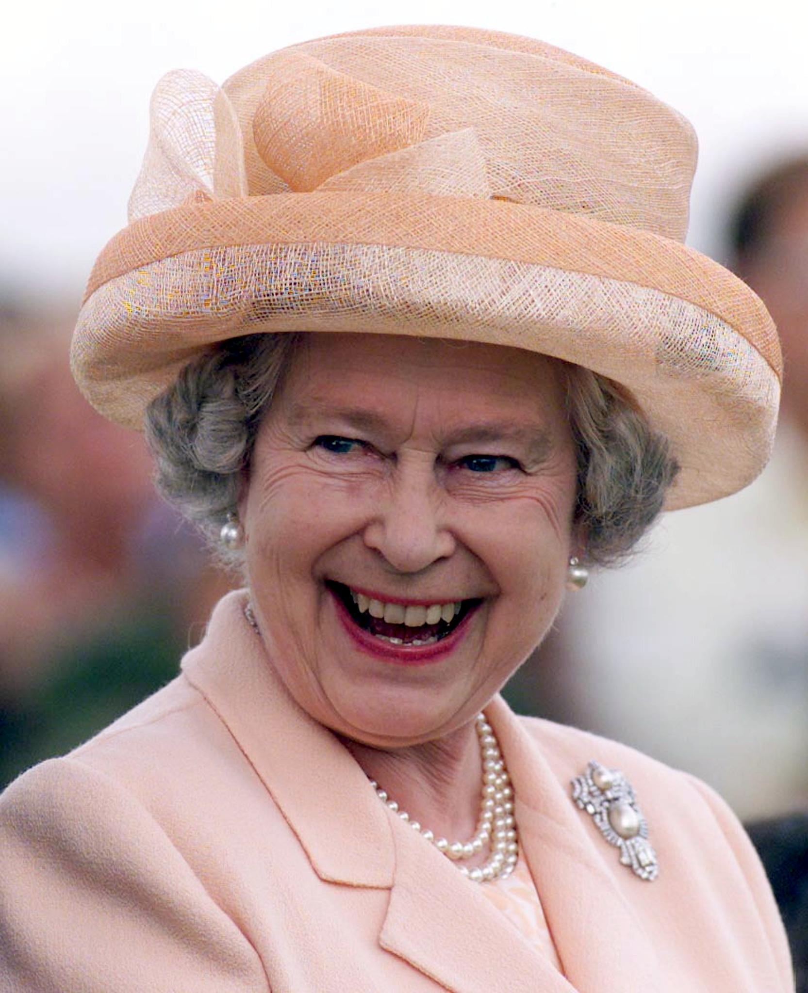 Queen Elizabeth II watches a polo match in 2000
