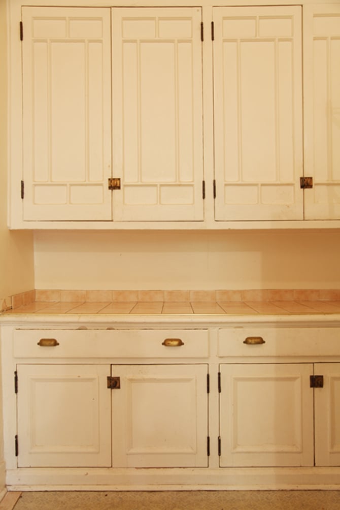 Built-in cabinetry can easily be restored, and this area of the home has lots of promise.