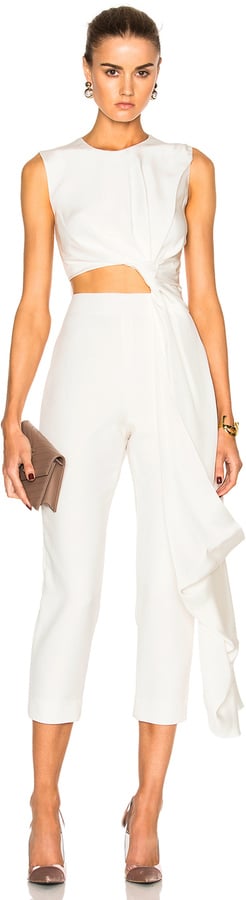 If you're looking for something a little more modern, opt for this Roksanda Bridal Silk and Bonded Crepe Jumpsuit ($2,325). The twist detail on the side along with the ruffle accent acts as an elegant touch.