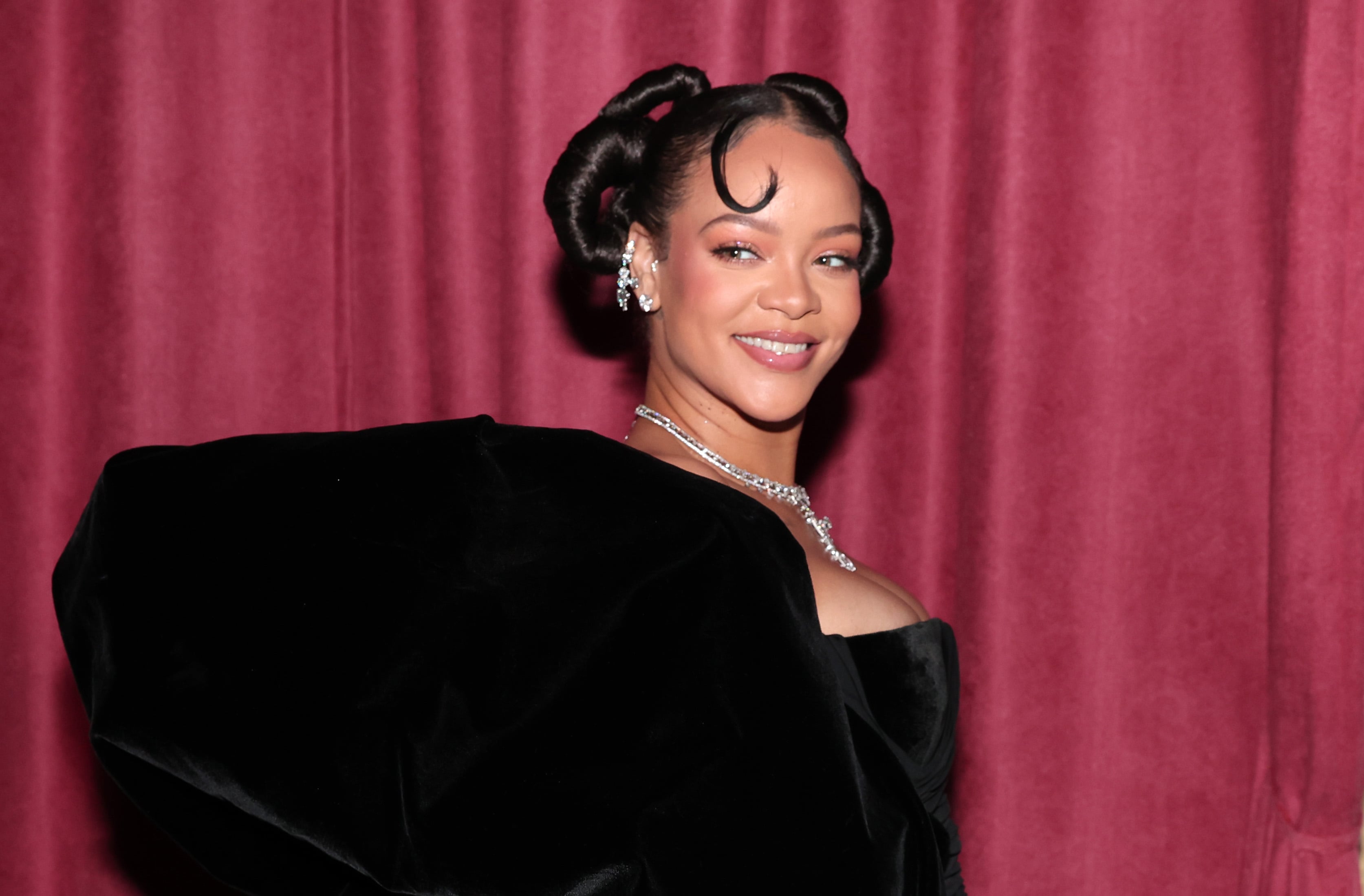 rihanna golden globes 2023 dress Rihanna's Black Schiaparelli Gown at Africa Clothing
