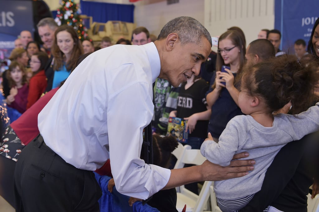 Obamas at the Marine Corps Toys For Tots Event 2014