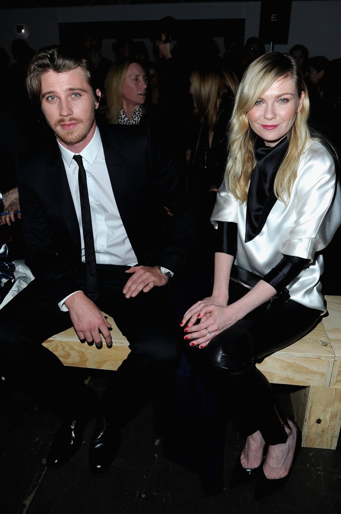 Kirsten Dunst and Garrett Hedlund sat front row at the Saint Laurent runway show at Paris Fashion Week on Monday. Kirsten Dunst and Garrett Hedlund sat front row at the Saint Laurent runway show at Paris Fashion Week on Monday.