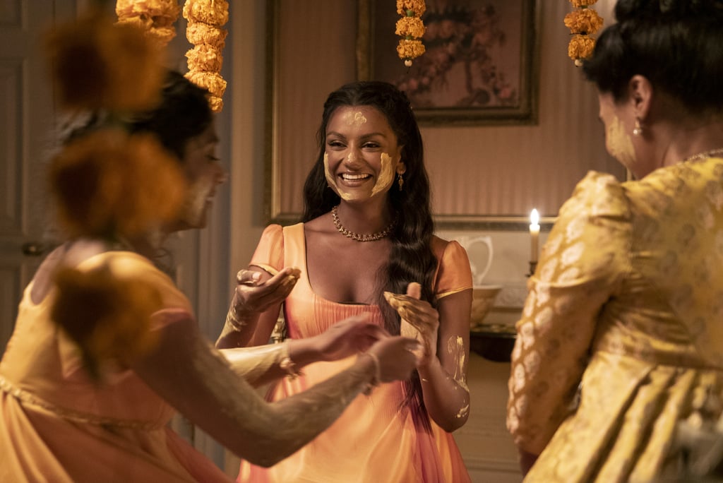 PS: It was just such a pivotal and emotional moment to see so many of our South Asian traditions and heritage being celebrated on such a huge Netflix show, such as the Haldi ceremony, the hair oiling scene, and when you and Charithra called each other "Didi." Did you realise the impact those moments would have on viewers when you were acting them out?
SA: I don't think anyone could have prepared us for the wonderfully overwhelming reaction, especially to the Haldi scene. I've never brought anything like that to screen before in my life, so that was incredible to perform with Charithra and the team. The hair oiling scene was my favourite because that was one that I definitely resonated with. I think a lot of women from a variety of heritages and cultures can relate to that really intimate bonding moment of two women applying coconut oil to their hair. I really loved filming that scene with Charithra and I think her performance in it is truly so amazing. There's such a pivot within the story and the fact that I could carry that scene as her eldest sister applying coconut oil to her hair, that's just incredible. It was done in the most non-performative authentic way.
PS: It really resonated with me because that's just something I've done my entire life and now millions of people around the world are going to see our culture, which is so cool!
SA: Exactly, this is representation. It's sharing our culture with the world and normalizing it.