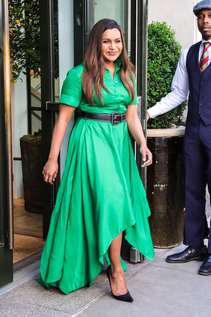 In May 2018, Kaling was spotted leaving her hotel in New York in this emerald-green high-low shirtdress by Solace London, complete with a black belt to add structure and simple pumps.