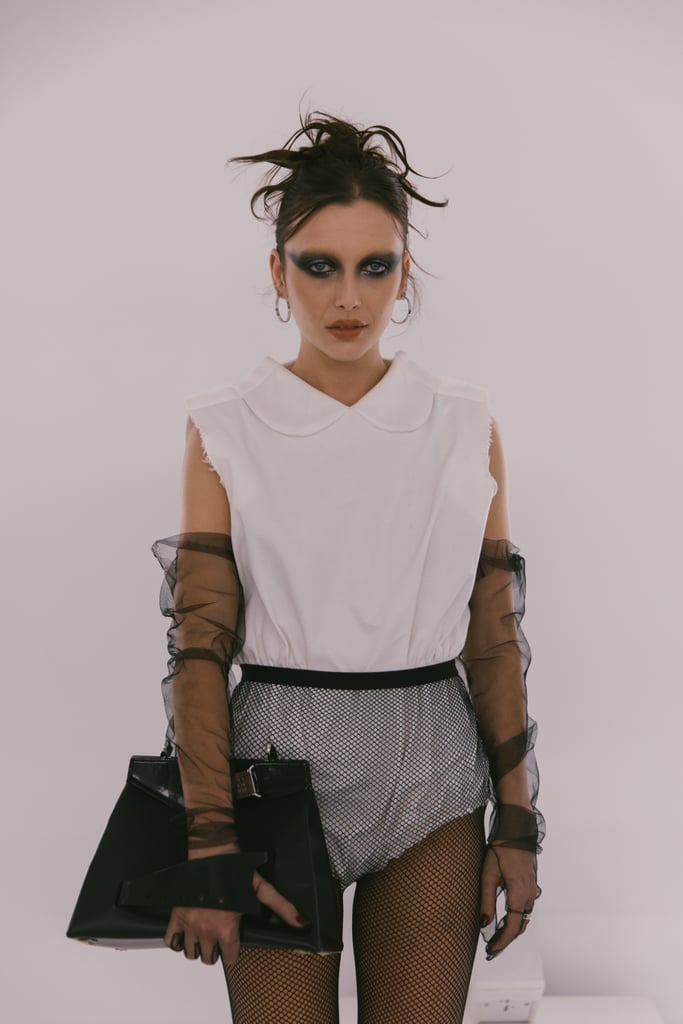 Emma Chamberlain Wearing Fishnet Tights