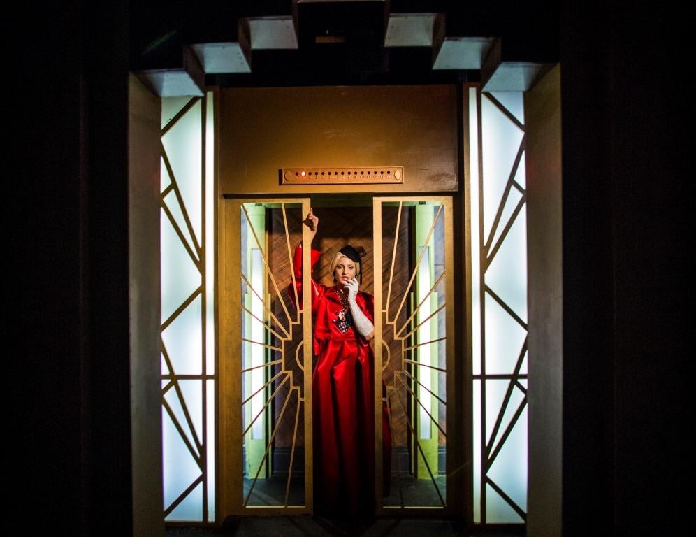 Ready to check in to the Hotel Cortez? Lady Gaga's Countess character welcomes you in by writhing within a faux elevator, and also snarling at you. Wouldn't hurt to take a hospitality course or something, girl.