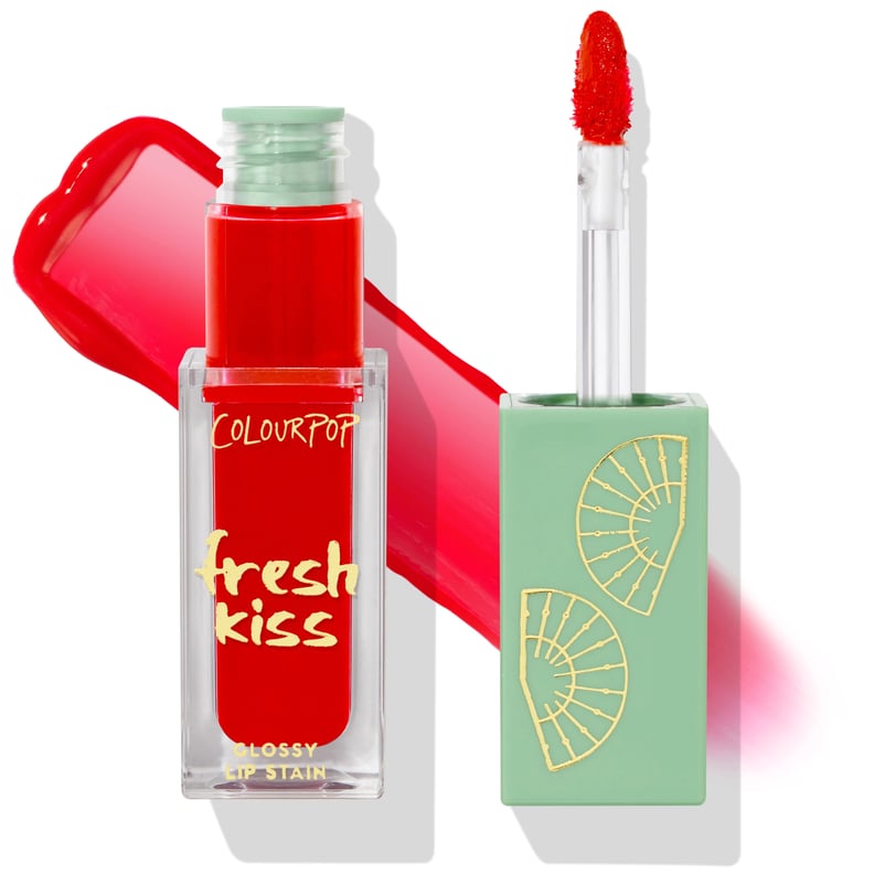 A Red Lip Stain: Fresh Kiss Glossy Lip Stain in Fanatic