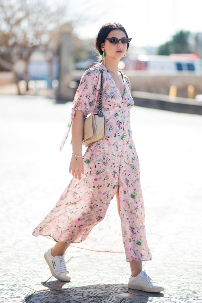 Try dressing down a whimsical printed shirt dress with classic white low-tops.