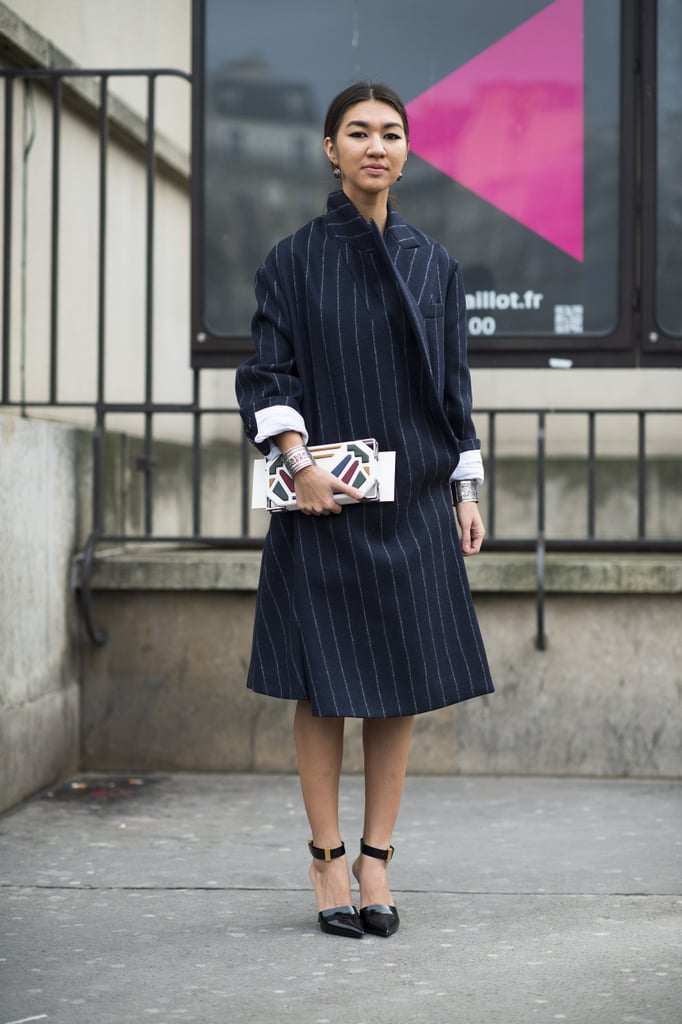 A pinstriped coat and eclectic wares — it's like The Wolf of Wall Street went to Fashion Week. 
Source: Le 21ème | Adam Katz Sinding