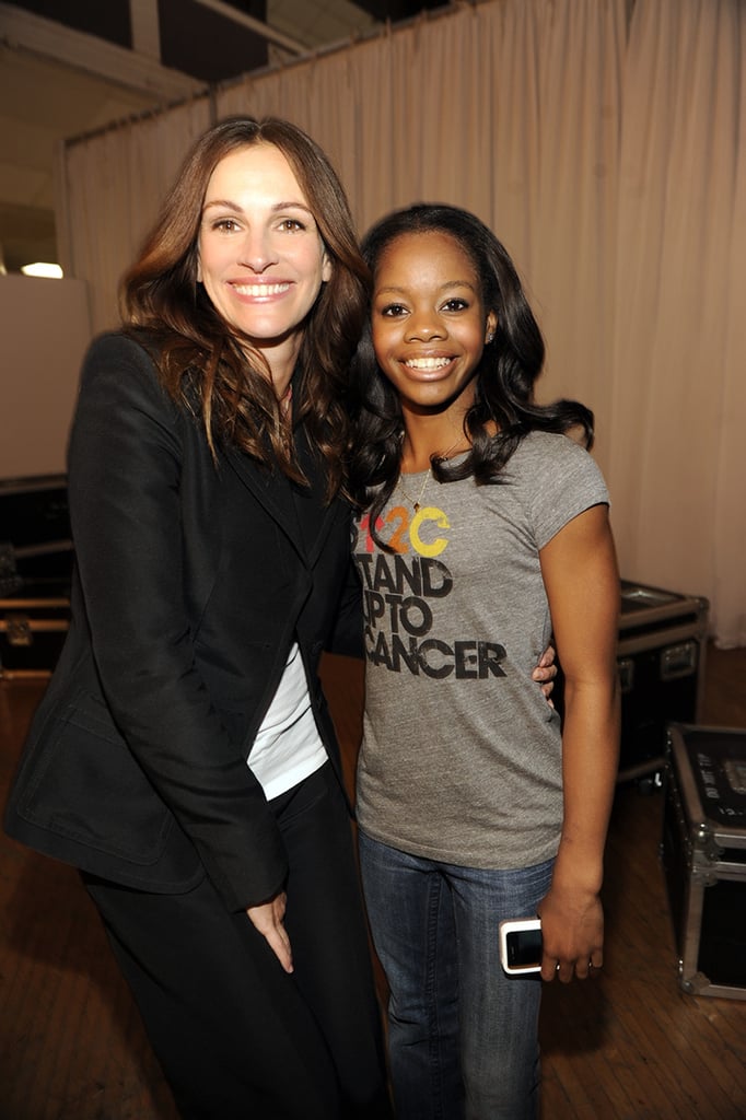 Julia and Olympic gymnast Gabby Douglas smiled backstage at an LA Stand Up to Cancer event in September 2012.