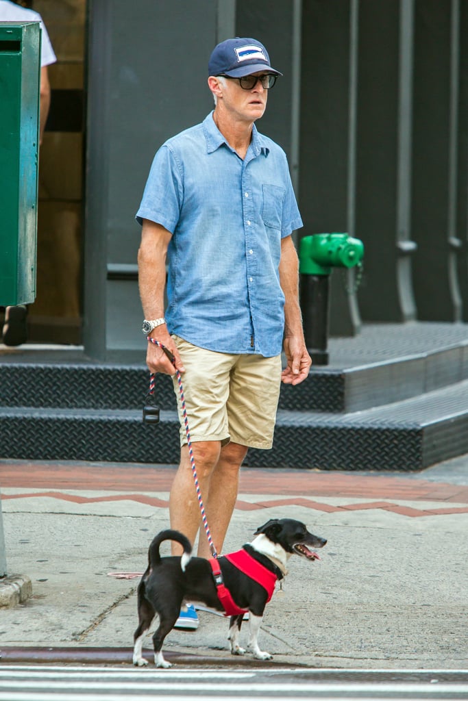 John Slattery walked his canine companion around NYC in July 2015.