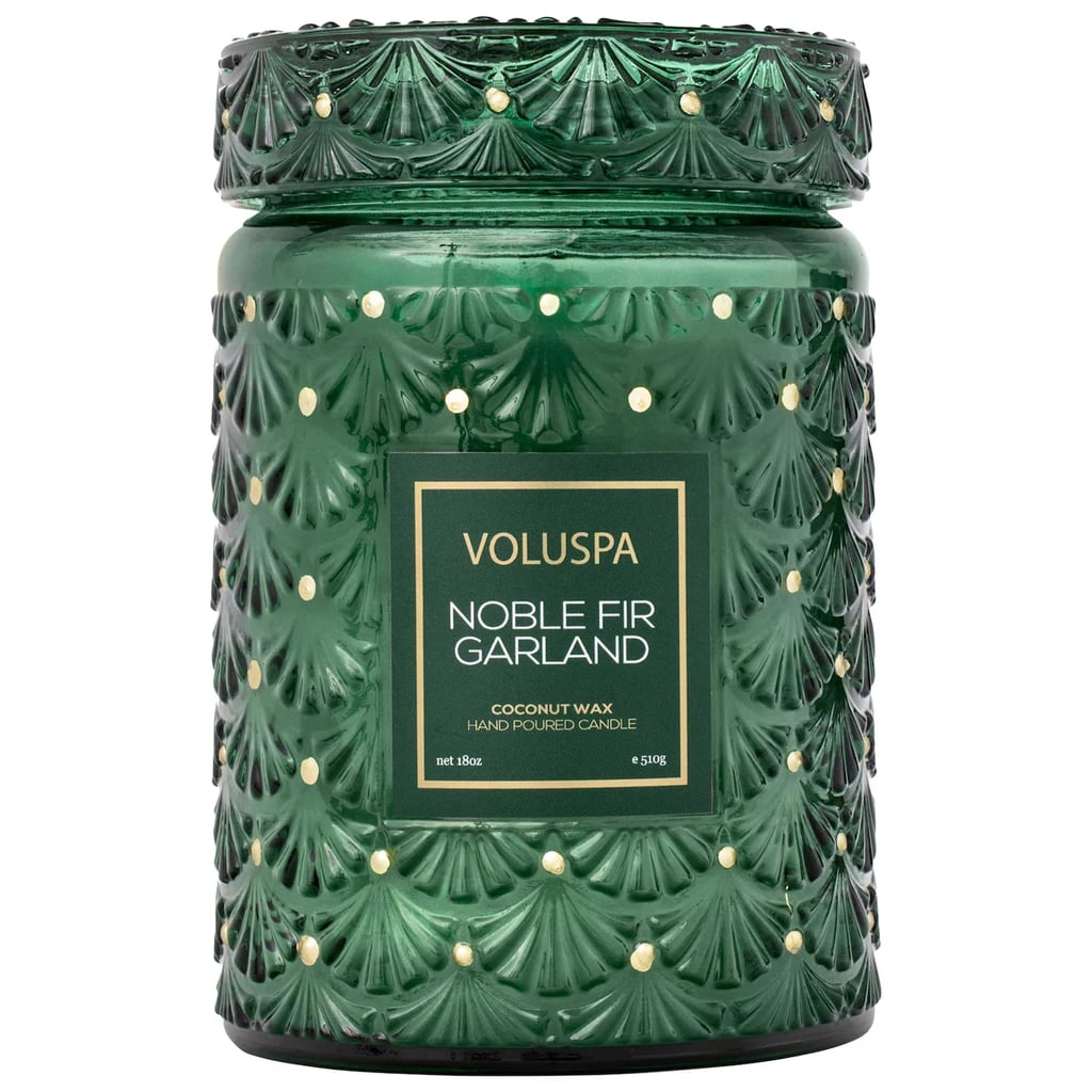 Voluspa Noble Fir Garland Glass Jar Candle ($48)
"Nothing screams the holidays like the scent of pine and balsam. Come November, that's the only scent I want burning in my house. Voluspa makes some of the best holiday scents around. The Noble Fir Garland Glass Jar Candle has notes of rosemary, fir needles, and amber for a cozy, earthy scent that will make your house smell like a Christmas tree farm and is the perfect gift for family, friends, or yourself." — Jessica Harrington, section lead, beauty
