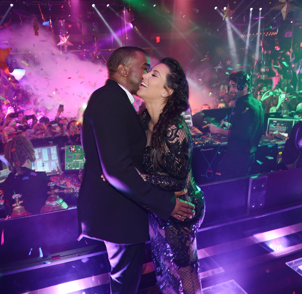Kim Kardashian and boyfriend Kanye West kissed at her New Year's Eve party in Las Vegas after announcing she's pregnant with their first child.
Kim Kardashian and boyfriend Kanye West kissed at her New Year's Eve party in Las Vegas after announcing she's pregnant with their first child.
