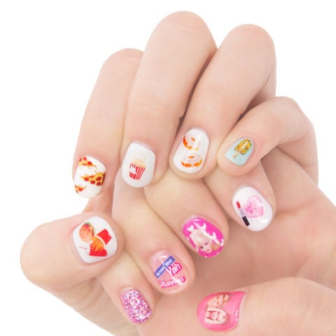 "I've really been into negative space nails because my nails can grow out and I'll still look put together. These nail stickers are my favorite because you can place any of the designs on a naked nail with a gel top coat and you're set for a month. I get so many compliments whenever I use these, I mean, who wouldn't want to see donuts and pizza slices on your fingertips? Nail art is such a fun way to express yourself, and these make it so easy to do!"  
#OOTD Nail Stickers  ($8)