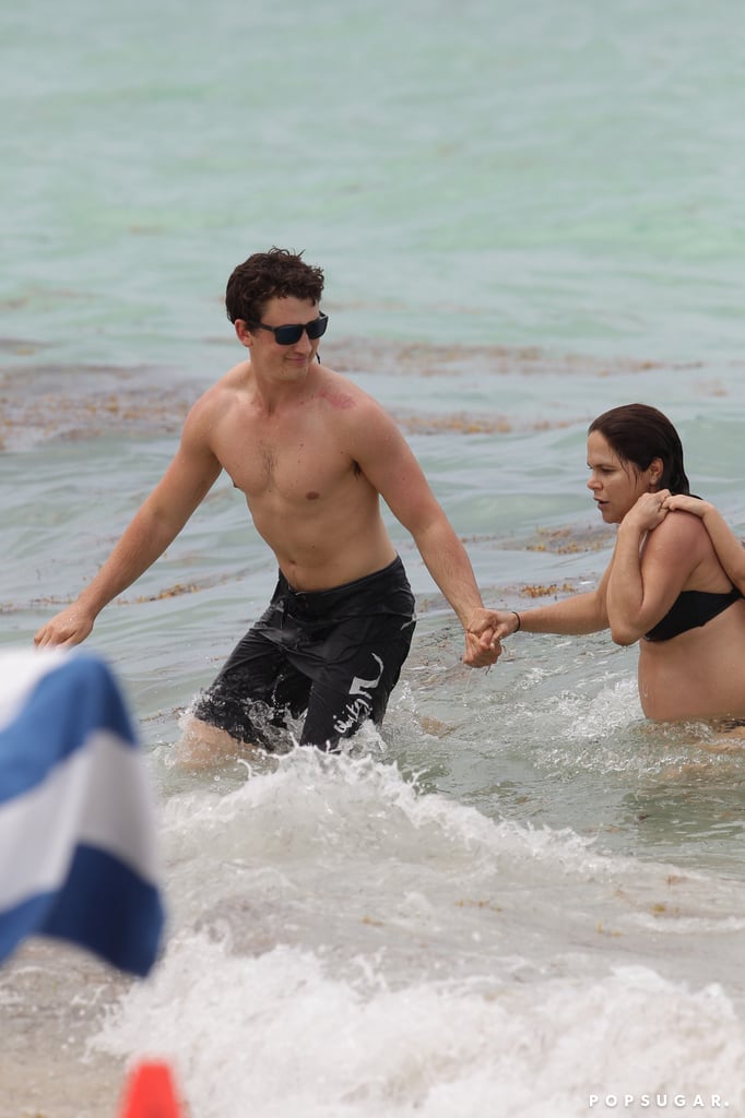 Miles Teller and His Girlfriend on the Beach in Miami